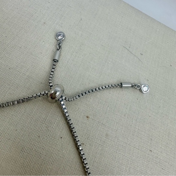 Classic Tennis Silver Tone Adjustable Bracelet with Crystals - Picture 3 of 6